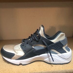 Women’s Black and Gold Nike Huaraches